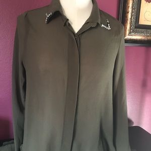Olive green silk blouse.